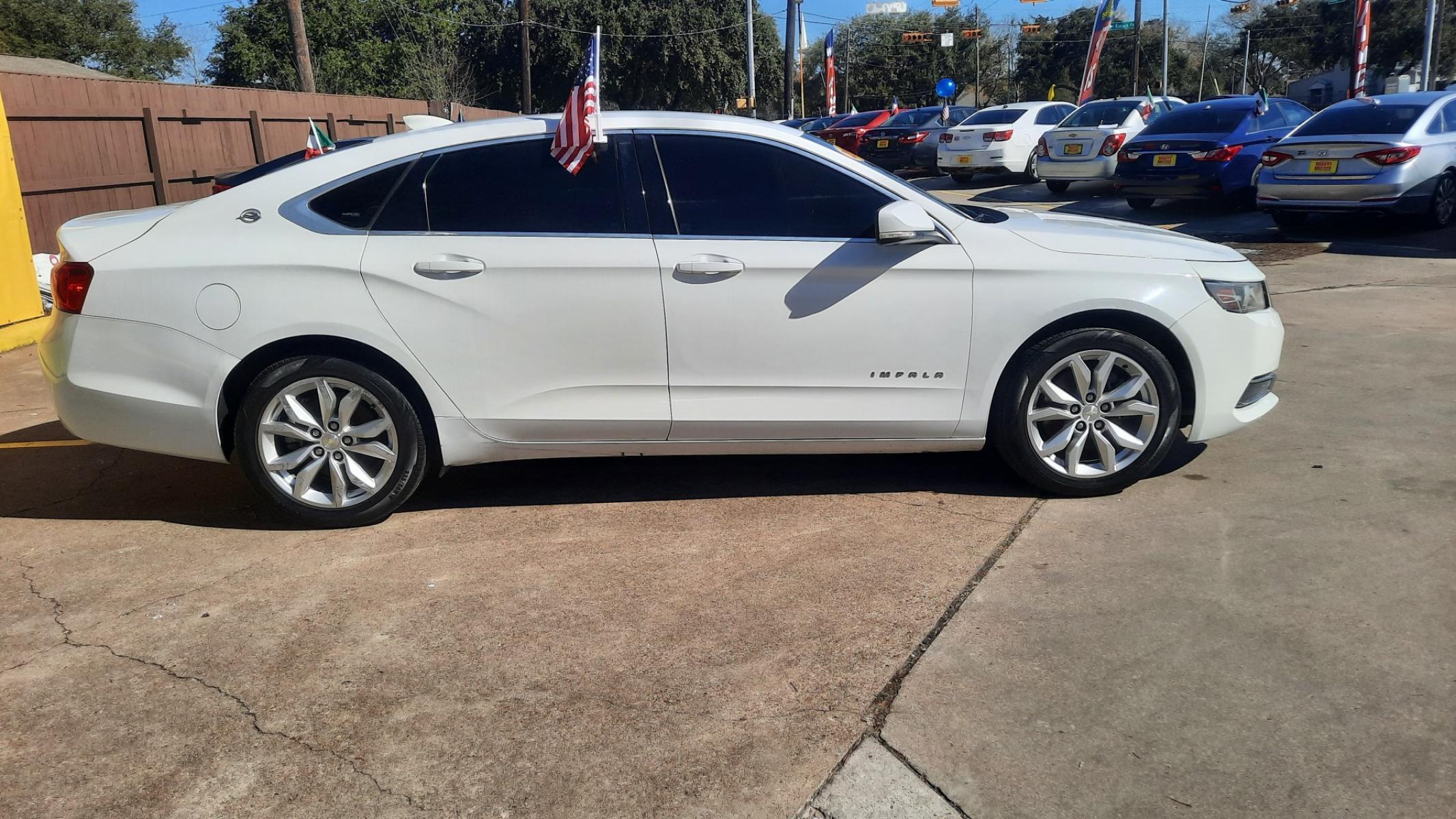 2017 Chevrolet Impala (2G1105S32H9) , located at 16710 Clay Rd., Houston, TX, 77084, (281) 859-7900, 29.834864, -95.656166 - Photo #0